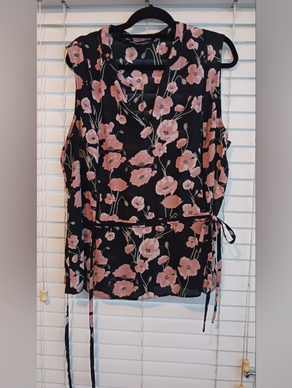 Sleeveless Floral Wrap Blouse in Black and Pink